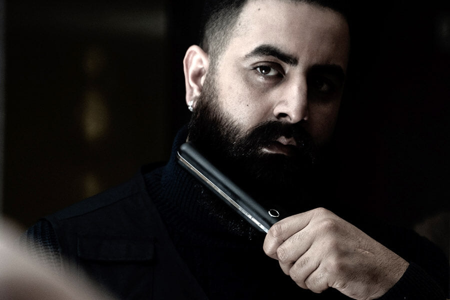How does a heated beard brush work?