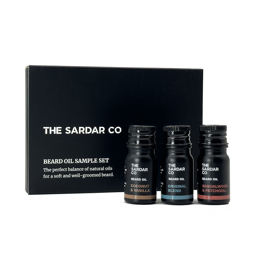 Three sample beard oil bottles from The Sardar Co with a black box in the background.
