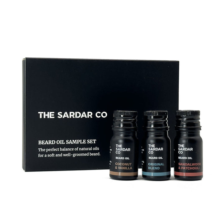 Three sample beard oil bottles from The Sardar Co with a black box in the background.