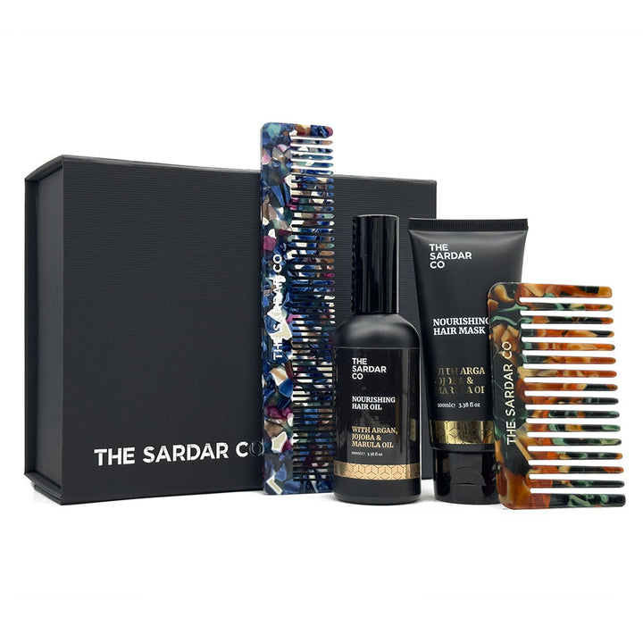 hair care products in a gift set neatly laid out