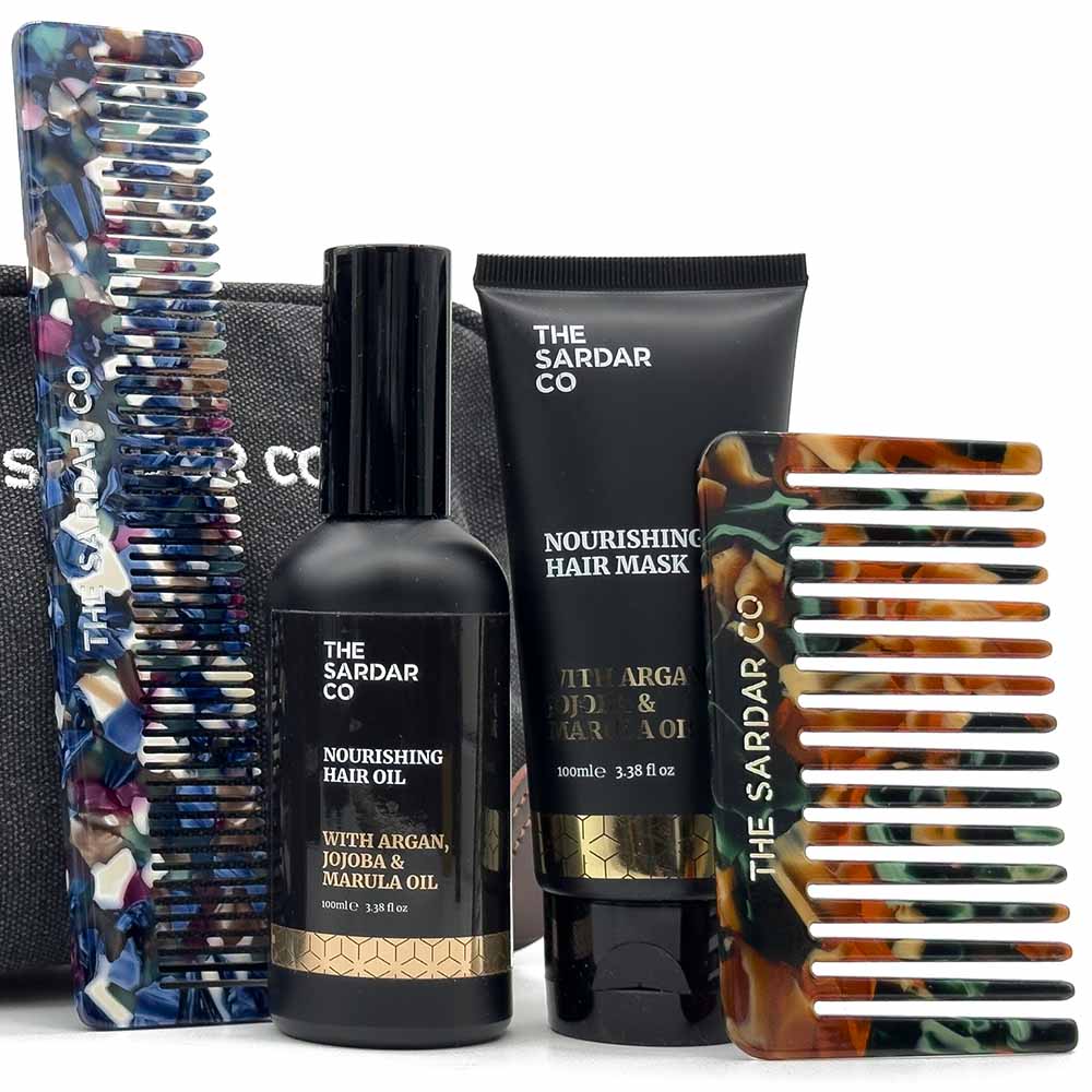 Set of hair care products including hair oil, hair mask, and combs from The Sardar Co on a white background.