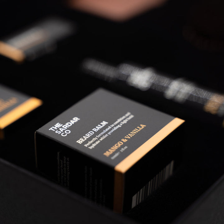 close up of mango and vanilla beard balm in gift set