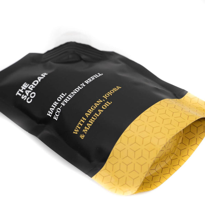 hair oil pouch on table