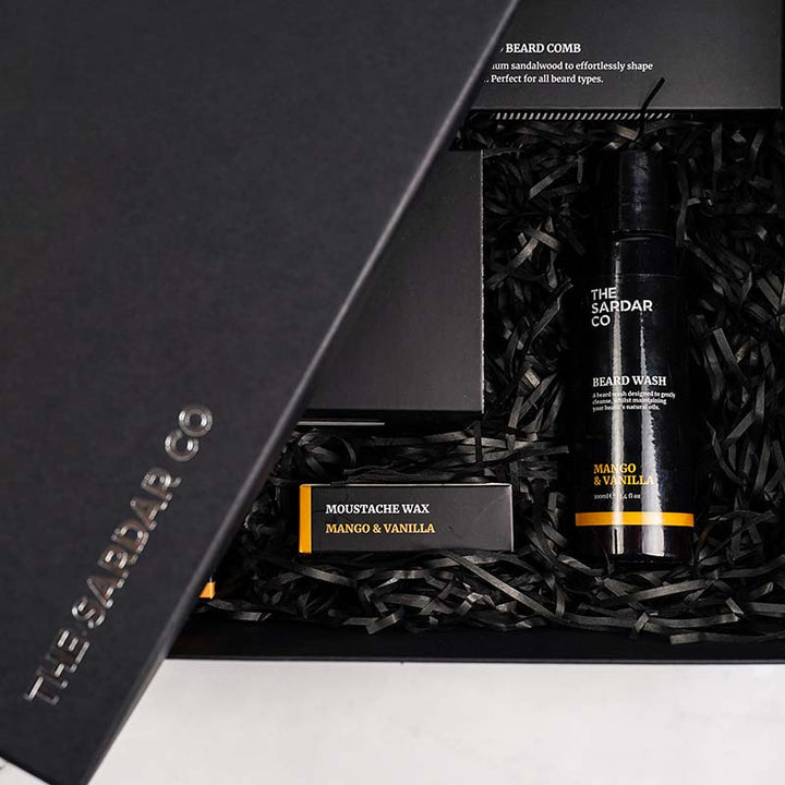 ultimate-gift-set-mango-and-vanilla-packed-with-shredded-paper-closeup